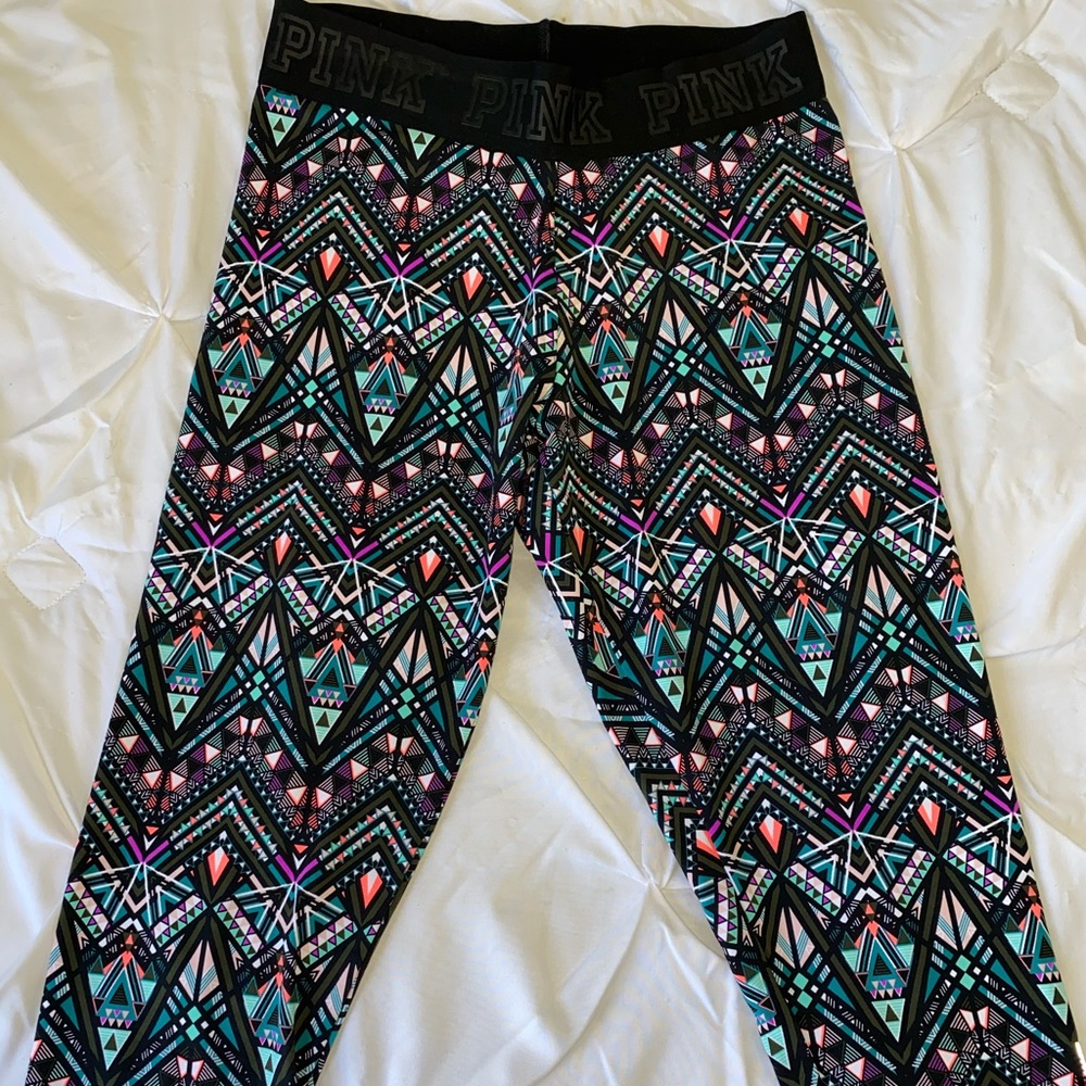 Pink cropped multi colored leggings. Size small